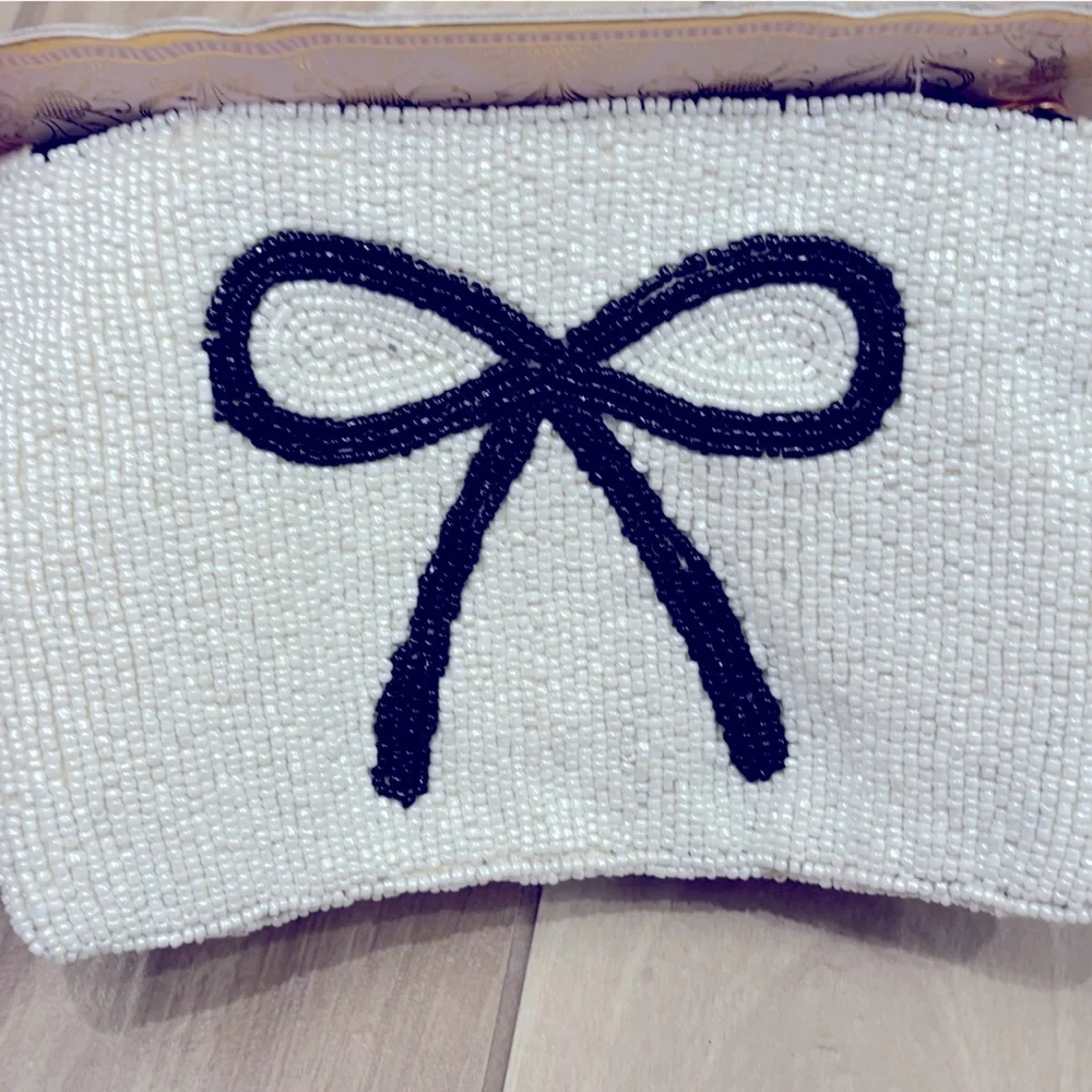 NWT Wandering Moon hand beaded travel pouch with black and white Bow Design